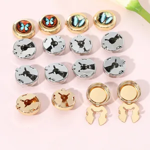 Elegant men's butterfly cufflinks in gold and silver finish with detailed enamel inlay