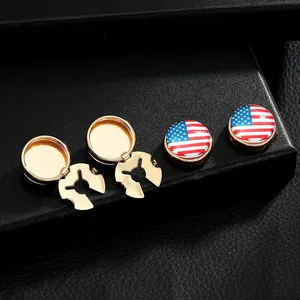 Detail of USA flag button covers with gold-tone base and open-clasp mechanism