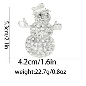 Detailed view of rhinestone snowman brooch with size specifications of 5.3cm by 4.2cm
