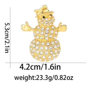 Detailed view of snowman brooch with dimensions 5.3cm by 4.2cm in sparkling rhinestones