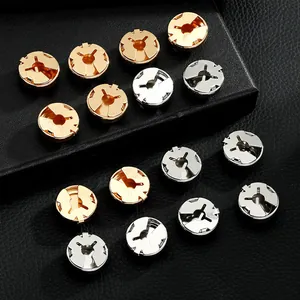 Detailed macro view of butterfly cufflinks in gold and silver finish on leather