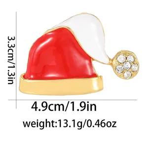 Detailed view of Santa hat brooch with red enamel, white rhinestones and size measurements