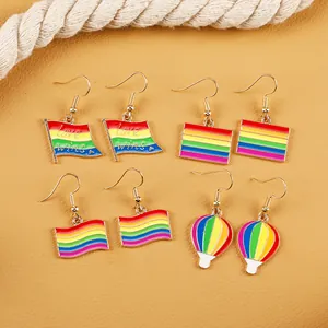 Rainbow heart and hot air balloon earrings with Love Wins design on yellow leather