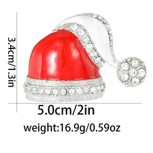 Detail view of enamel Christmas hat brooch with white rhinestones and specific dimensions