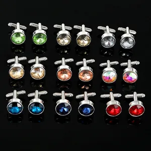 Detailed set of men's colorful crystal cufflinks with silver-toned metal bases