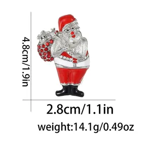 Detail view of Santa Claus brooch with red enamel finish and sparkling rhinestones