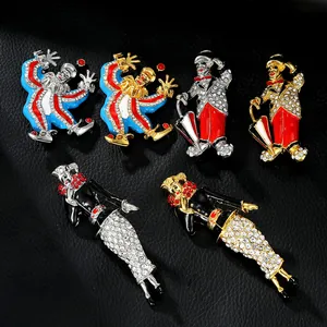 Macro detail of vintage circus clown brooches with colorful enamel and sparkling rhinestones