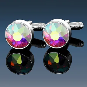 Macro view of men's silver cufflinks with rainbow iridescent satellite stones