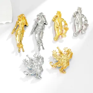 Vintage circus clown brooches in gold and silver finish with safety pin back view