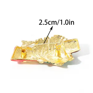 Detailed back view of Christmas tree brooch featuring a 2.5cm gold safety pin fastener