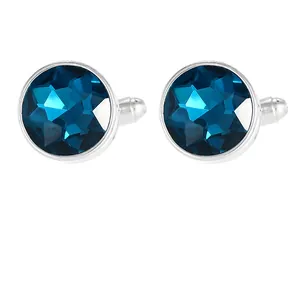 Mens round silver cufflinks with faceted dark blue crystal stone in a balanced layout