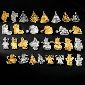 Detailed back view of Christmas pins set with secure safety clasps on dark textured background