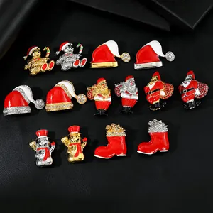 Detailed collection of assorted Christmas tree and Santa brooches with enamel and rhinestones