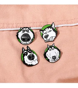 Detailed set of four cartoon husky dog enamel pins on pink denim fabric texture