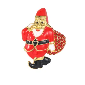 Charming Santa Claus brooch with red enamel and crystals on a golden alloy base