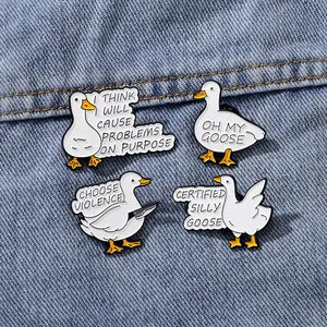 Funny cartoon goose enamel pins set with Choose Violence text on denim background