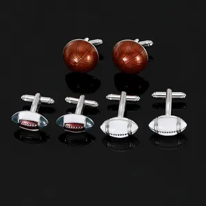 Three-pair set of basketball and rugby sport cufflinks on black reflective background