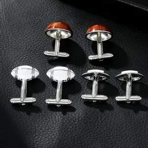 Three pairs of sports theme cufflinks featuring basketball, football and blue oval designs