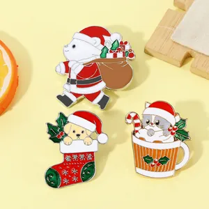 Close-up of cute Christmas bear and pet enamel pins on a warm yellow background
