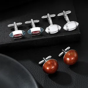 Macro shot of silver alloy cufflinks featuring rugby and basketball enamel sports designs