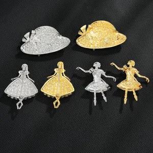 Polished gold and silver ballet dancer and hat brooches with secure pin back closure