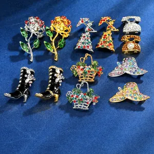Detailed close-up of colorful enamel and rhinestone alloy brooches in diverse motifs