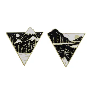 Cartoon triangle shield badges featuring night forest and mountain lake enamel scenes