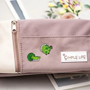 Canvas pencil case with purple-white contrast and cute crocodile enamel pins