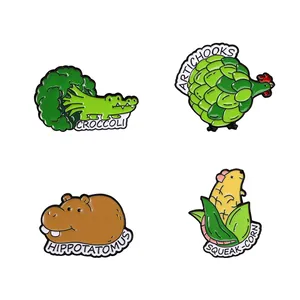 Set of 4 creative enamel pins featuring funny animal-vegetable hybrid designs on white background