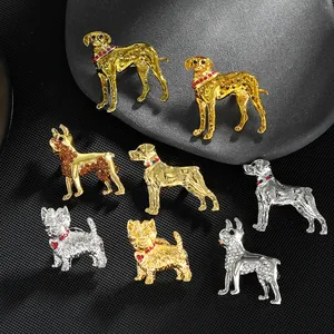 Collection détaillée de broches chiens vintage dorées et argentées avec cristaux