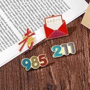 Set of 4 motivational metal pins including admission letter and success lucky charms