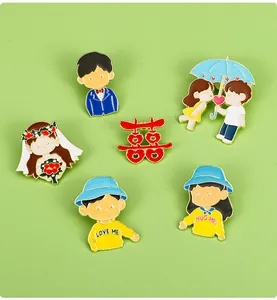 Detailed view of 6-piece wedding enamel pins set with love and cartoon characters