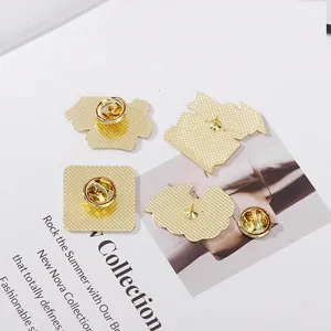 Golden graduation cap enamel pin backings with butterfly clutch and non-slip grid texture