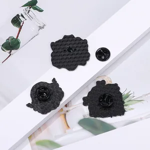 Black enamel punk skull pin back with honeycomb texture and secure butterfly clasps