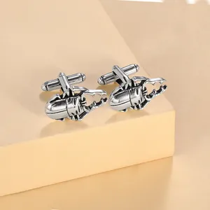 Vintage silver stag beetle cufflinks for men's shirts on a neutral display stand
