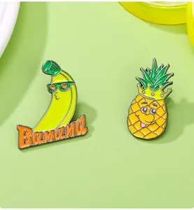 Détails de broches en émail représentant une banane cool et un ananas couronné