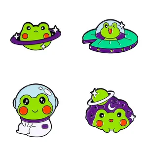 Süßes Weltraum-Frosch Emaille-Pin Set mit grünen Astronauten-Fröschen und bunten UFOs