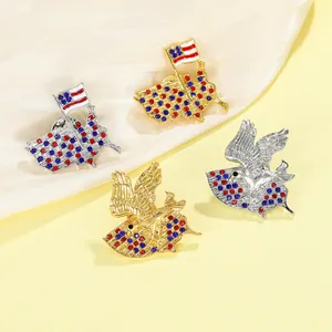 Detailed view of patriotic eagle and American map brooches with red and blue rhinestones
