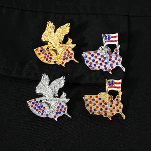 Detailed macro view of four vintage eagle and USA map brooches with colorful rhinestones