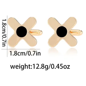 Detail von X-förmigen Gold-Manschettenknöpfen mit Emaille und Größenangaben