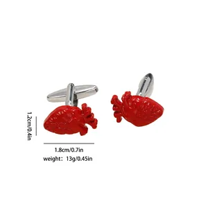 Anatomical heart cufflinks with red enamel finish and silver metal base for shirts