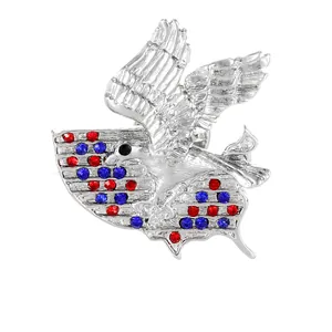 Vintage silver eagle brooch with red and blue crystals on a USA map shaped base