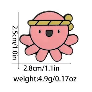 Close-up of pink octopus enamel pin with yellow headband including size specifications