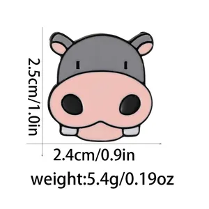 Macro view of cartoon hippo enamel pin with specific height and width measurements