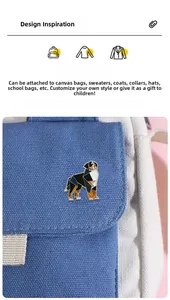 Detail of geometric Bernese Mountain Dog enamel pin styled on a blue canvas bag