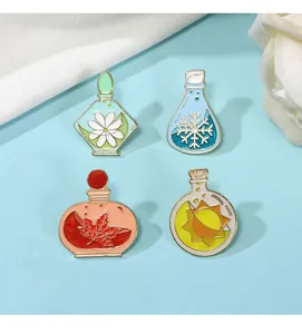 Detailed set of four seasonal enamel pins shaped like potion bottles on a blue background