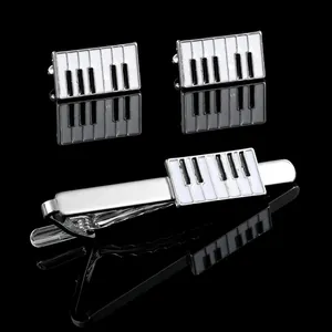 Men's silver piano key cufflinks and tie clip set with black and white enamel finish