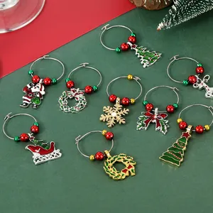 Set of 9 Christmas wine glass charms with snowman reindeer tree motifs and colorful beads