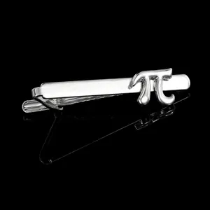 Detailed close-up of a silver tie clip with a mathematical pi symbol on black background