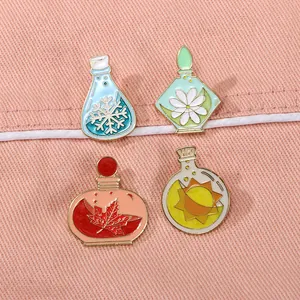 Four seasons enamel pins set featuring snowflake, flower, maple leaf and sun in bottles